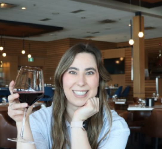 woman holding wine