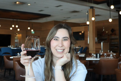 woman holding wine