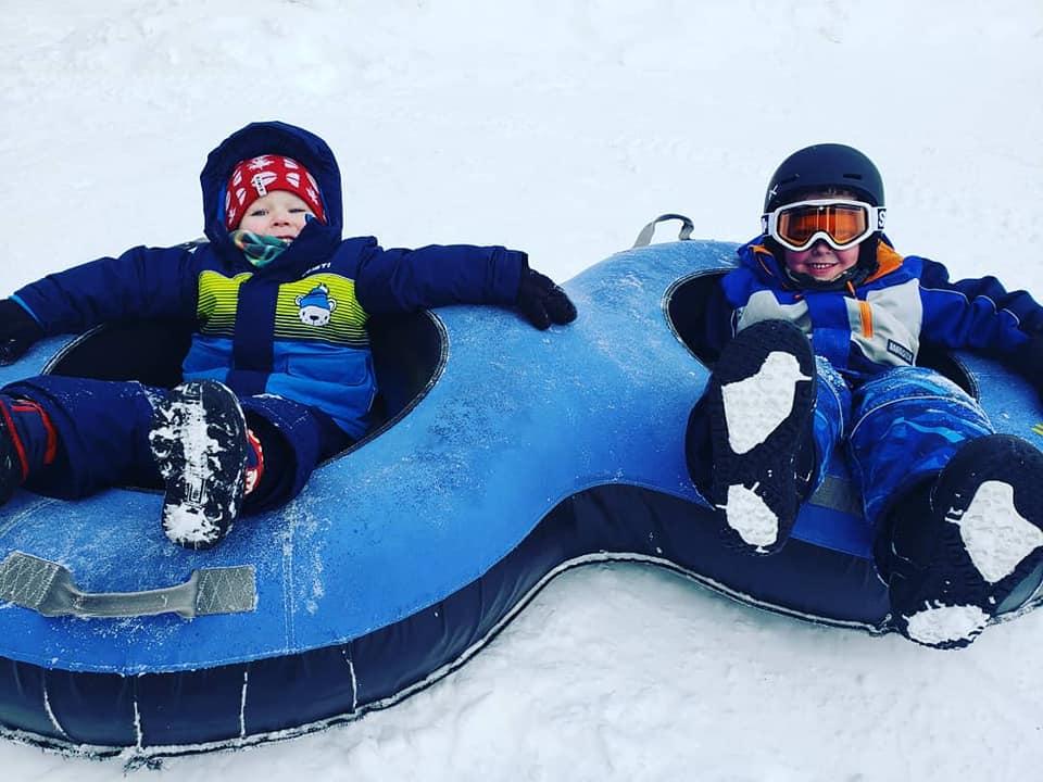 Kids slide down Apex Mountain at the tube park! (Photo courtesy: Apex Mountain Resort)