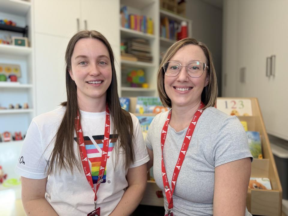 Sondrea Power and Dana Chapman welcome families to Baby Social and Family Playtime at the YMCA in Penticton.