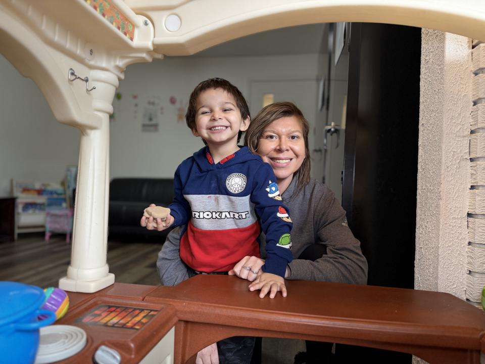 Ashley smiles with her son, Elijah, during drop-in playtime at BGC Okanagan in Penticton.