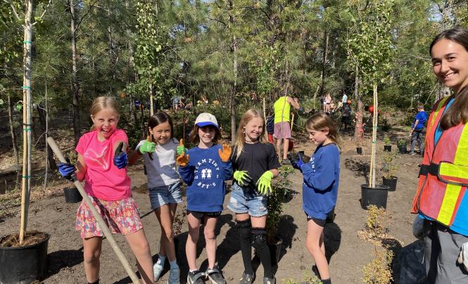Students planting during McNicoll planting event