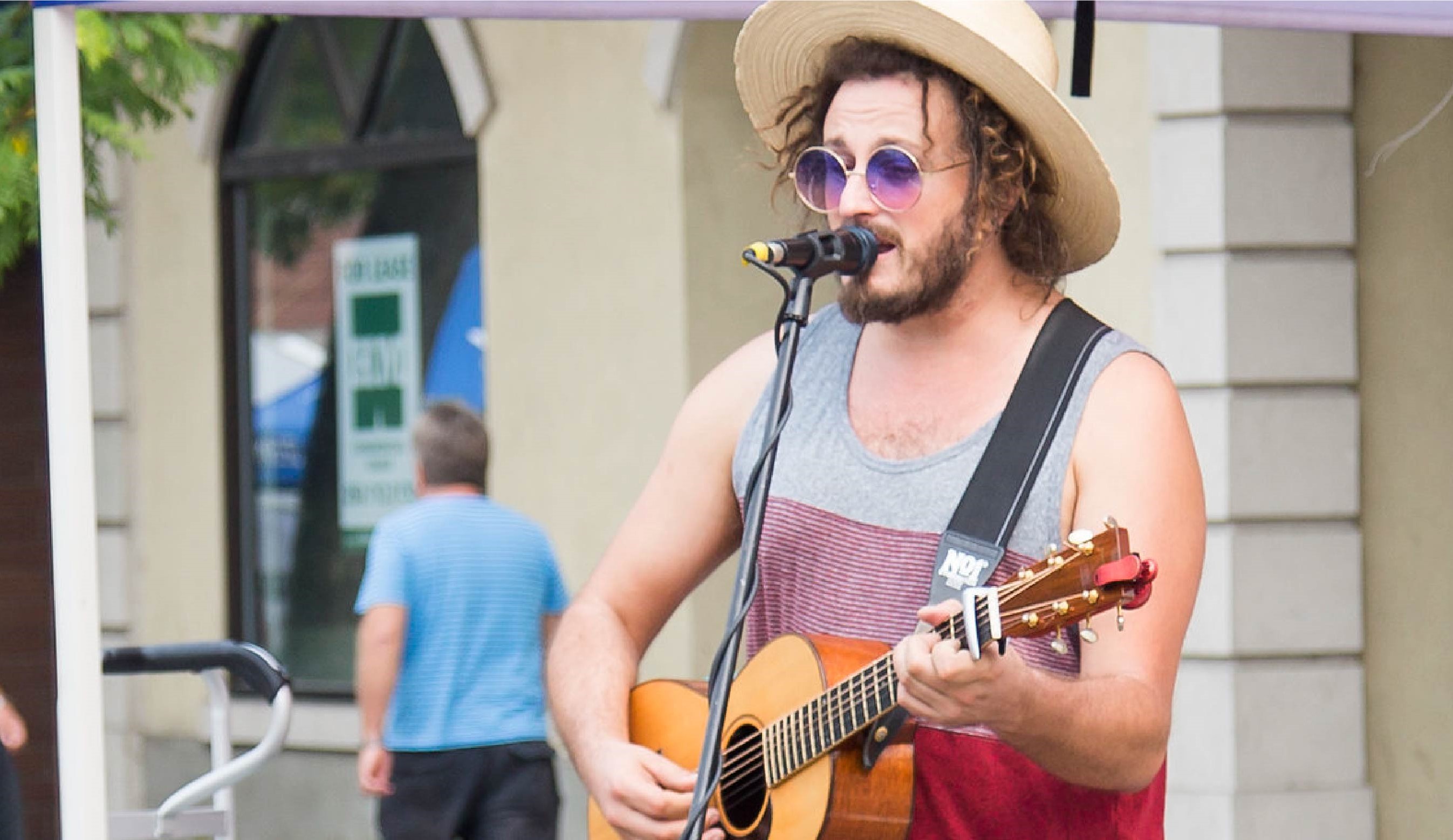 Man playing guitar in the street