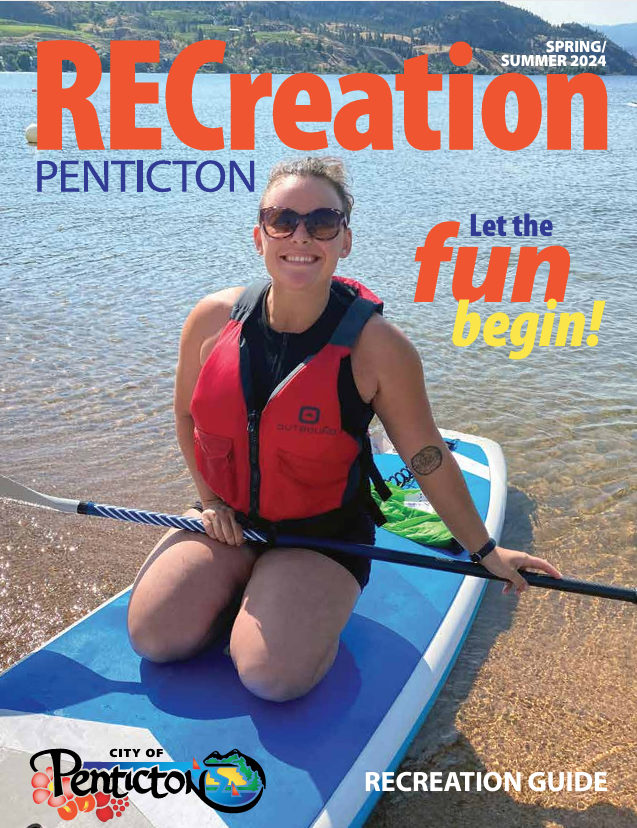 woman kneeling on paddleboard